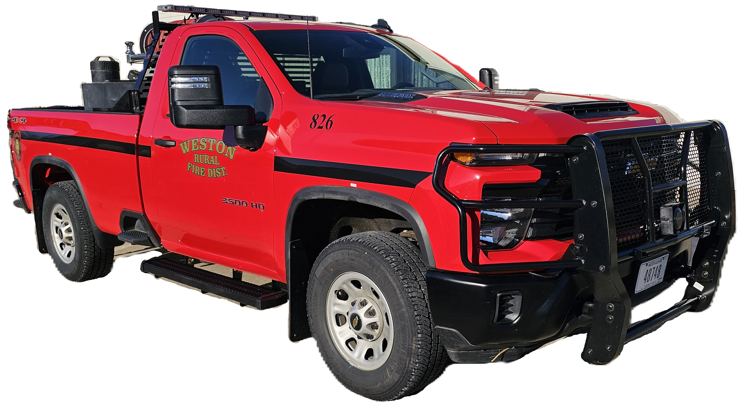 Red fire department pickup truck with black grille guard and Westin Rural Fire District logo, parked on a white background.