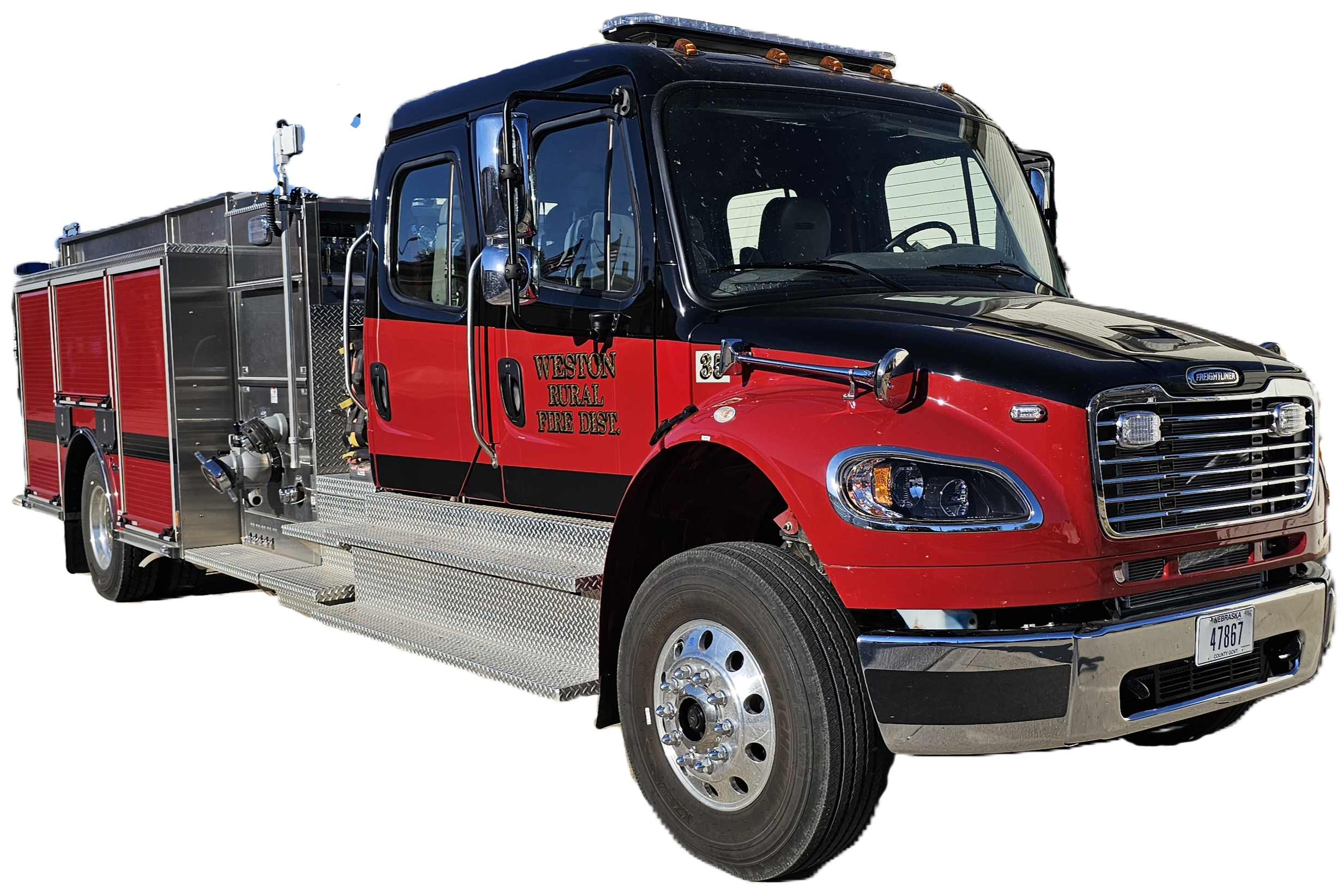 Red and black fire truck from Wesley Rural Fire Department with equipment compartments and ventilation system
