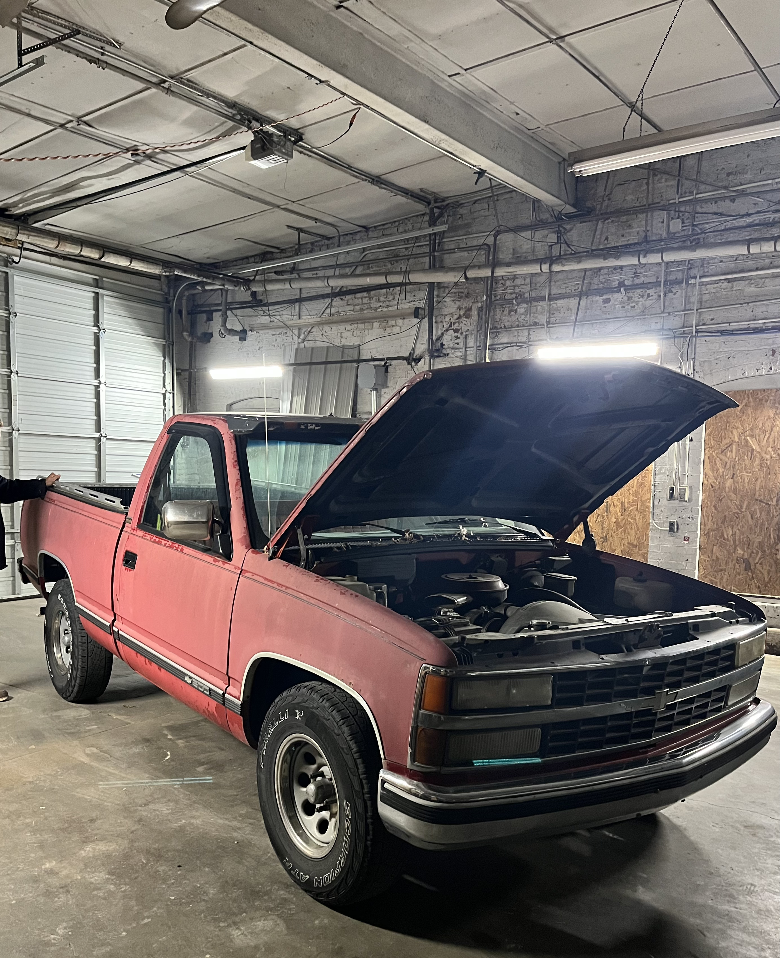 Now this one was a doozy lol... Rolled on tractor paint and I mean ROLLED on with a paint roller lol. Had a bulky visor caulk gun clued onto the roof and every suspension component was shot. The whole garage you see here turned red when I started to 