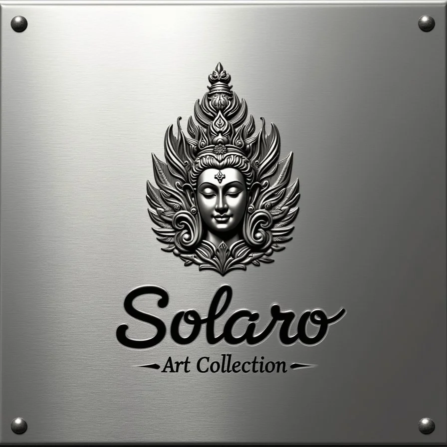 Silver metal sign with a detailed carved face of a serene female deity surrounded by ornate flames and a crown, featuring the text 'Solaro Art Collection' below.
