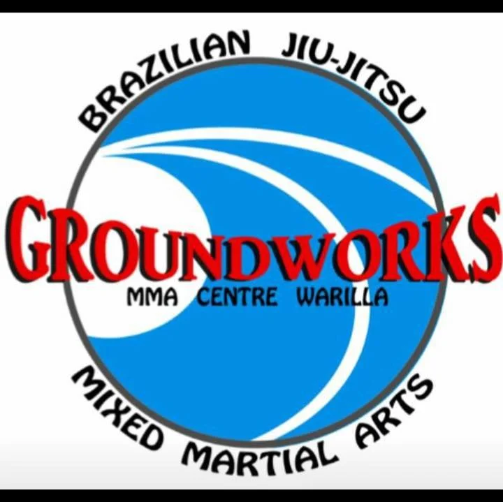 Logo for Groundworks Mixed Martial Arts Center featuring a blue and white wave design with bold red and black text indicating martial arts disciplines and location.
