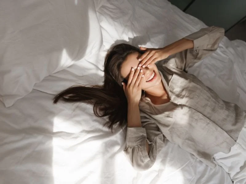 woman laying in bed