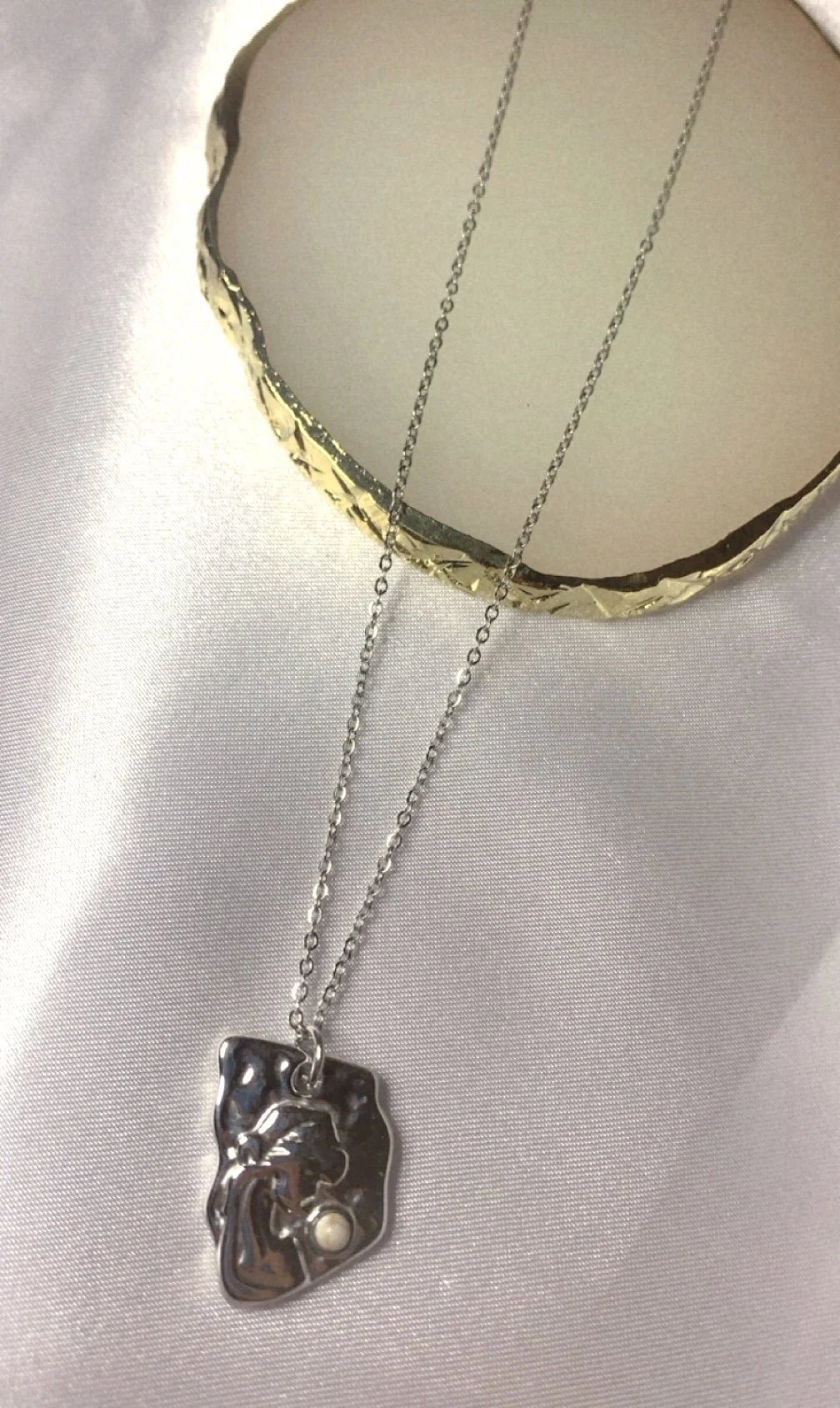 Collier à petit prix en acier inoxydable