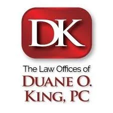 DK logo with text 'The Law Offices of Duane O. King, PC'