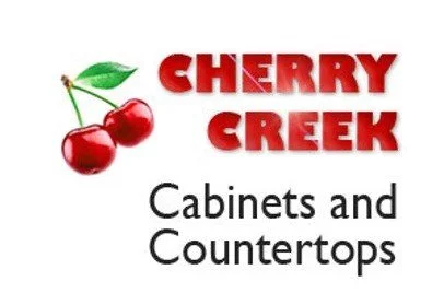 Cherry Creek Cabinets and Countertops logo with cherries and green leaves