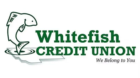 Logo of Whitefish Credit Union featuring a jumping fish and the text 'Whitefish Credit Union' with the slogan 'We Belong to You'.