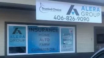 Signage for Alera Group with contact number, indicating services like insurance, home, auto, farm, and commercial insurance.