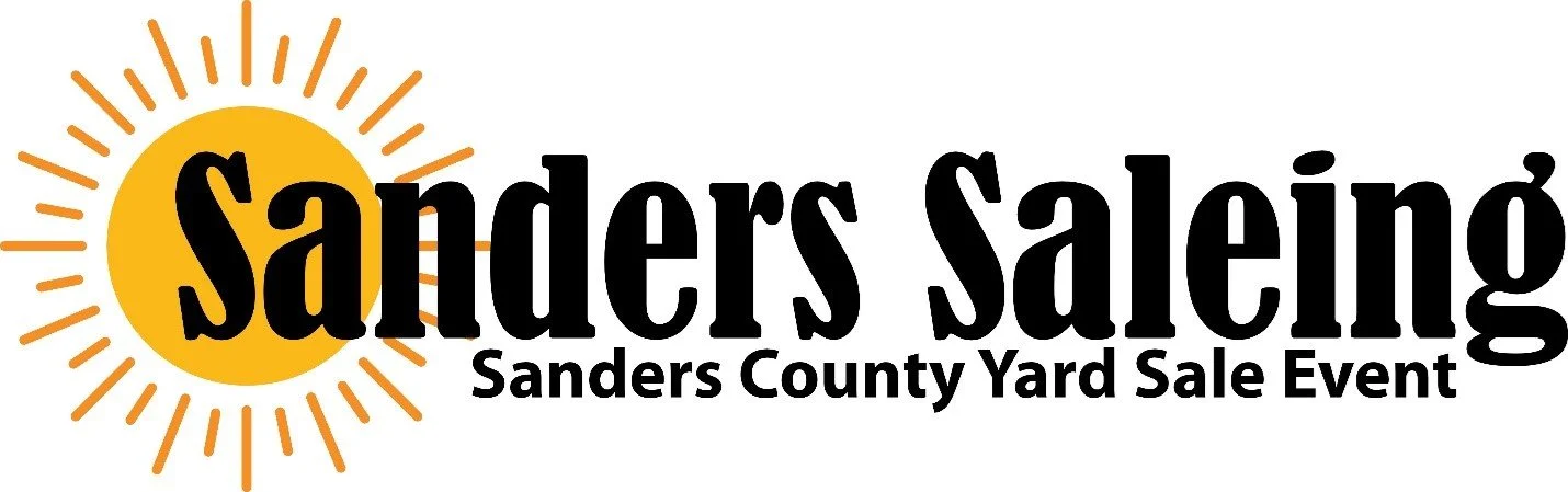 Logo for Sanders Sale, a Sanders County Yard Sale Event, featuring a stylized sun with orange rays and a yellow core.