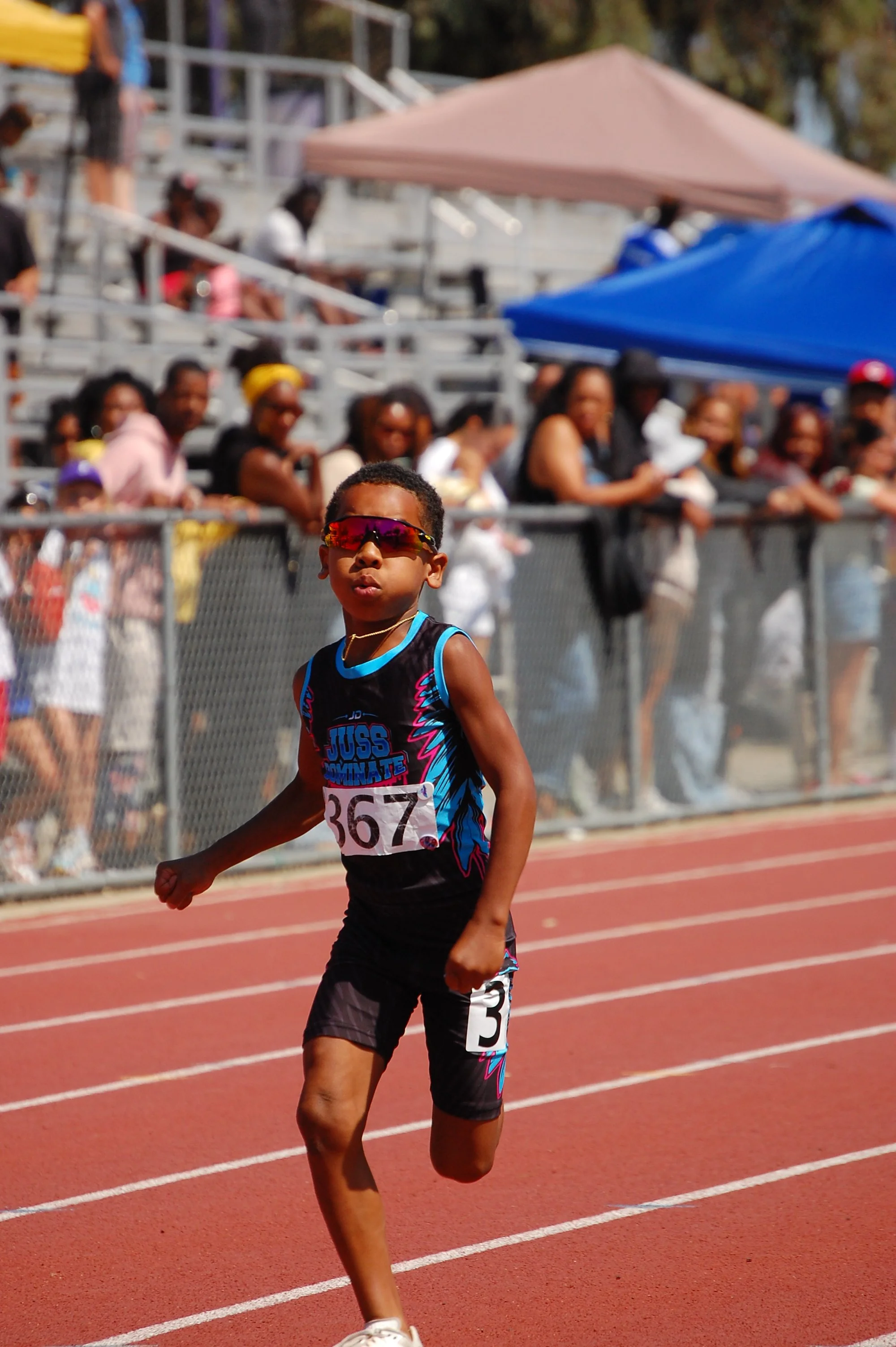 High-energy sports photography from a youth track and field competition