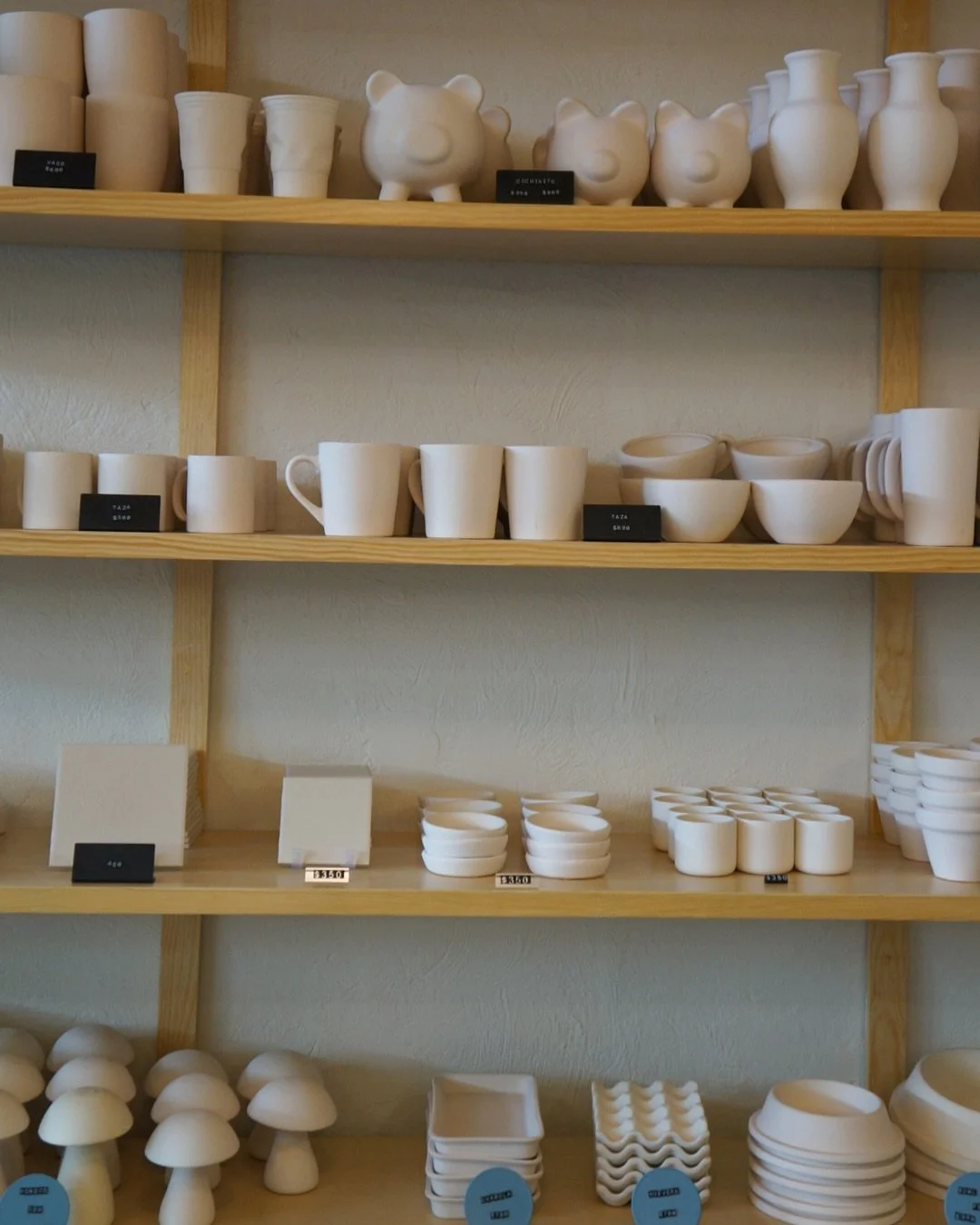 Ceramic cups from an arts and crafts place to be painted on.