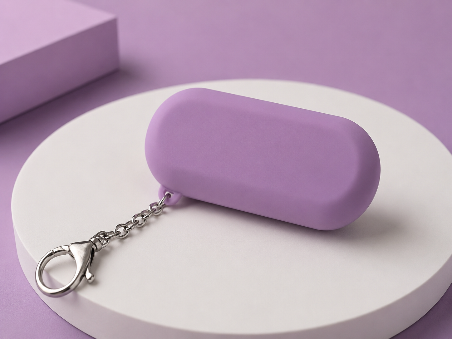 Purple anti-roofie drink safety keychain