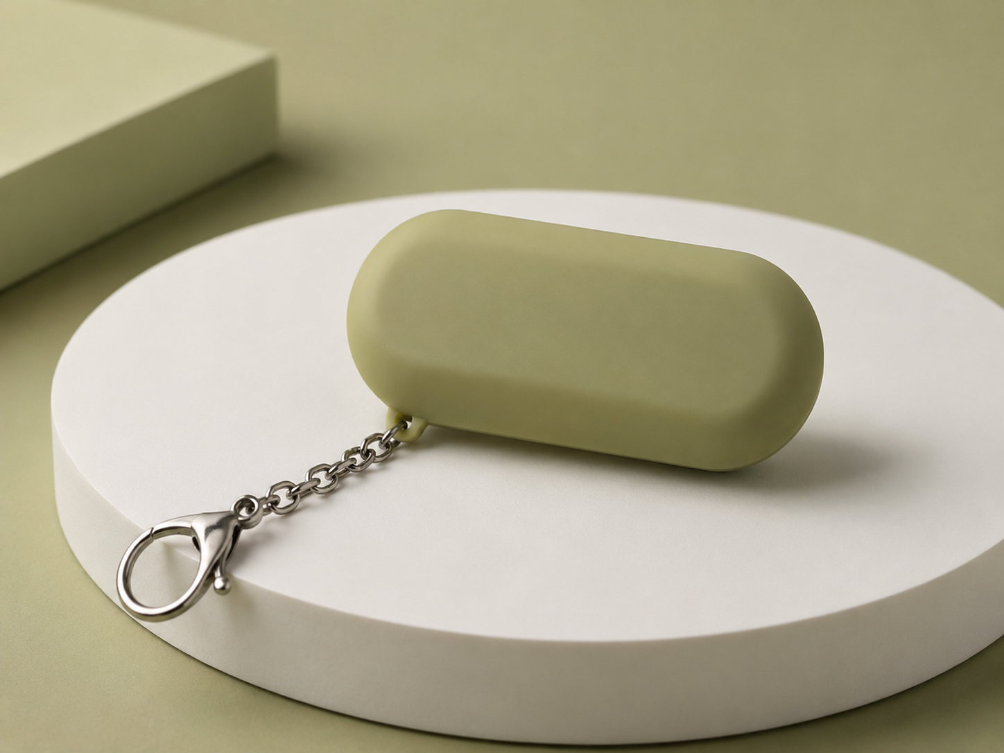 Green anti-roofie drink safety keychain