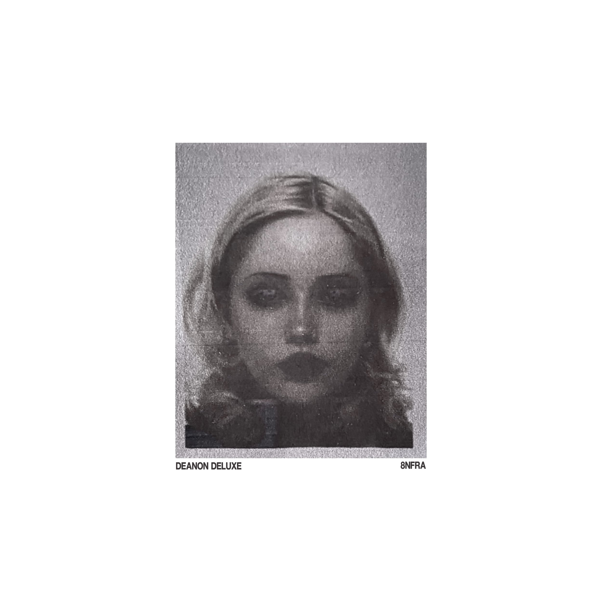 Black and white album cover featuring a woman's face with dark makeup and wavy hair, titled 'Deanon Deluxe' at the bottom left, and '8NFRA' at the bottom right.