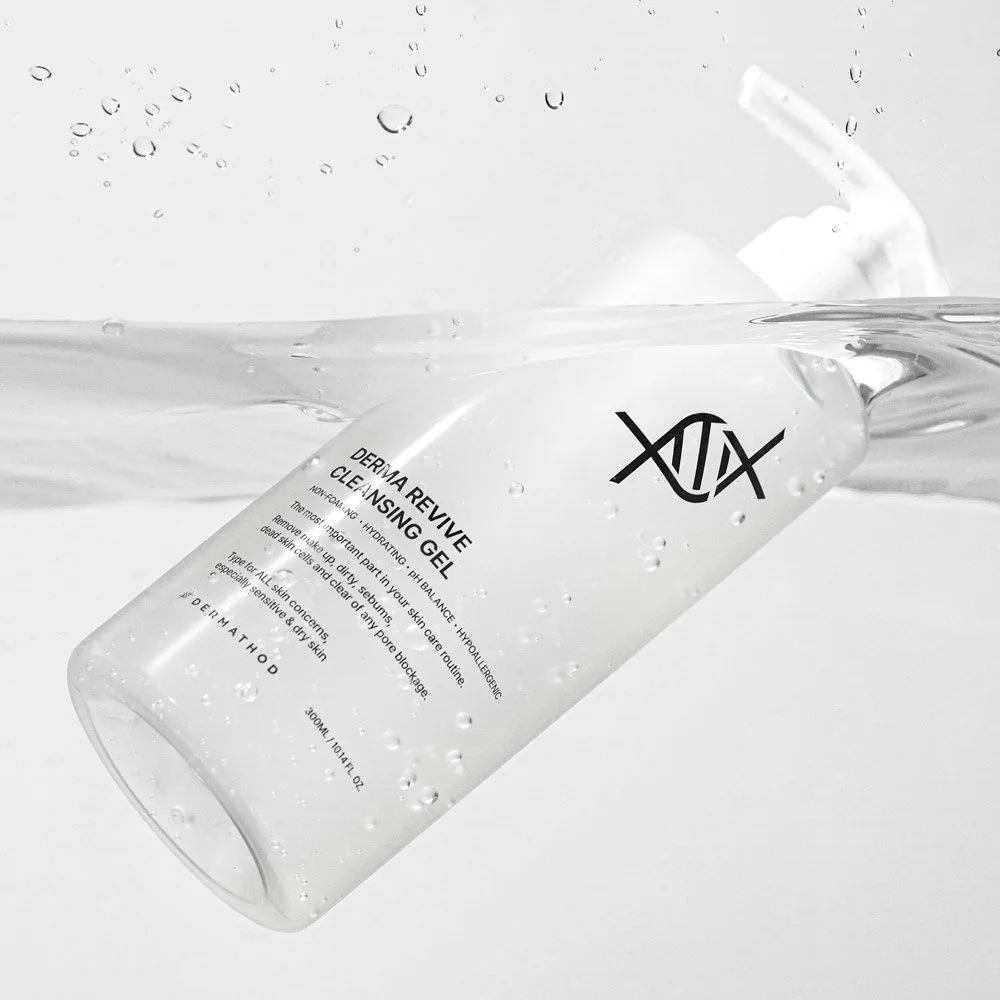 Dermathod Revive Cleansing Gel bottle in water front label view.jpg