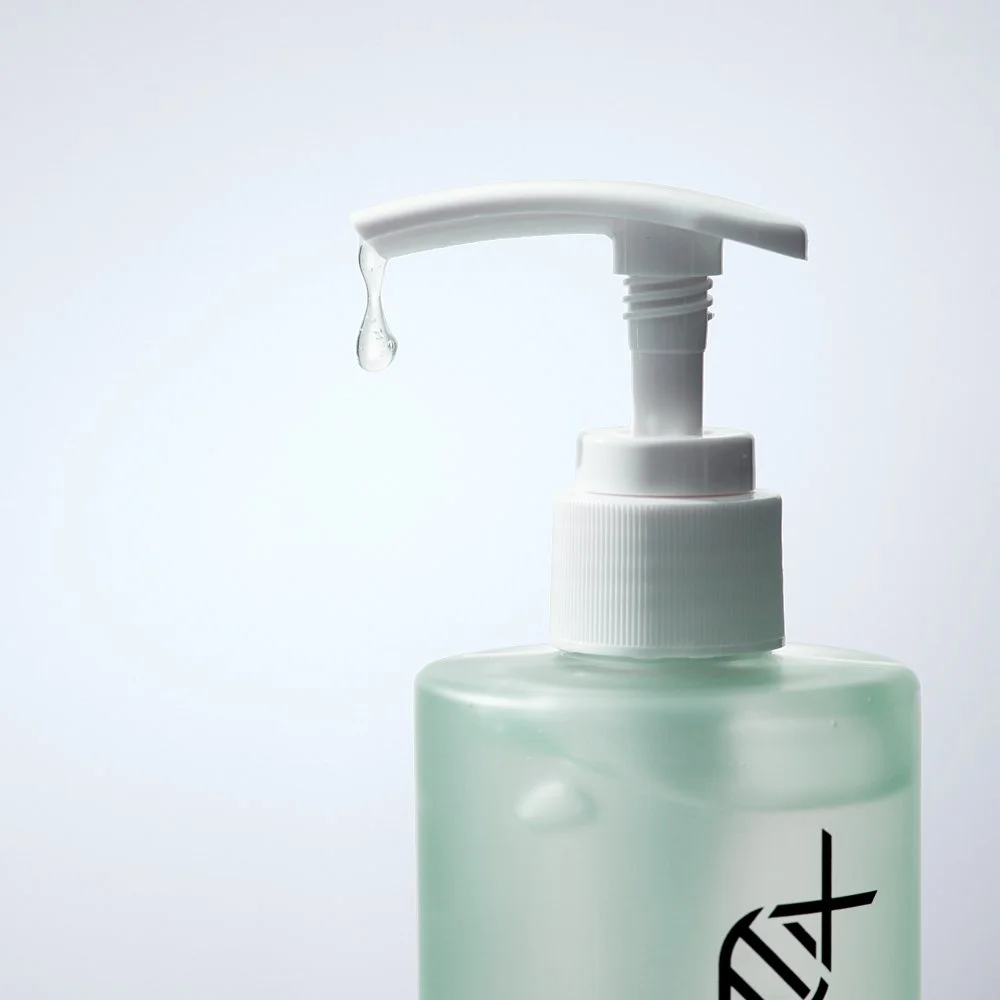 Dermathod Derma Revive Healer Gel drop of gel coming out of bottle pump.jpg