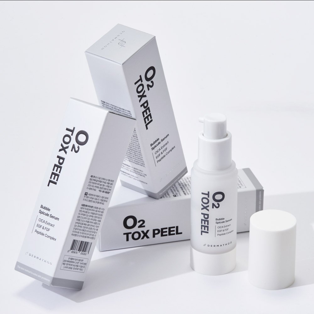Dermathod O2 Tox Peel packaging with lid off bottle.jpg