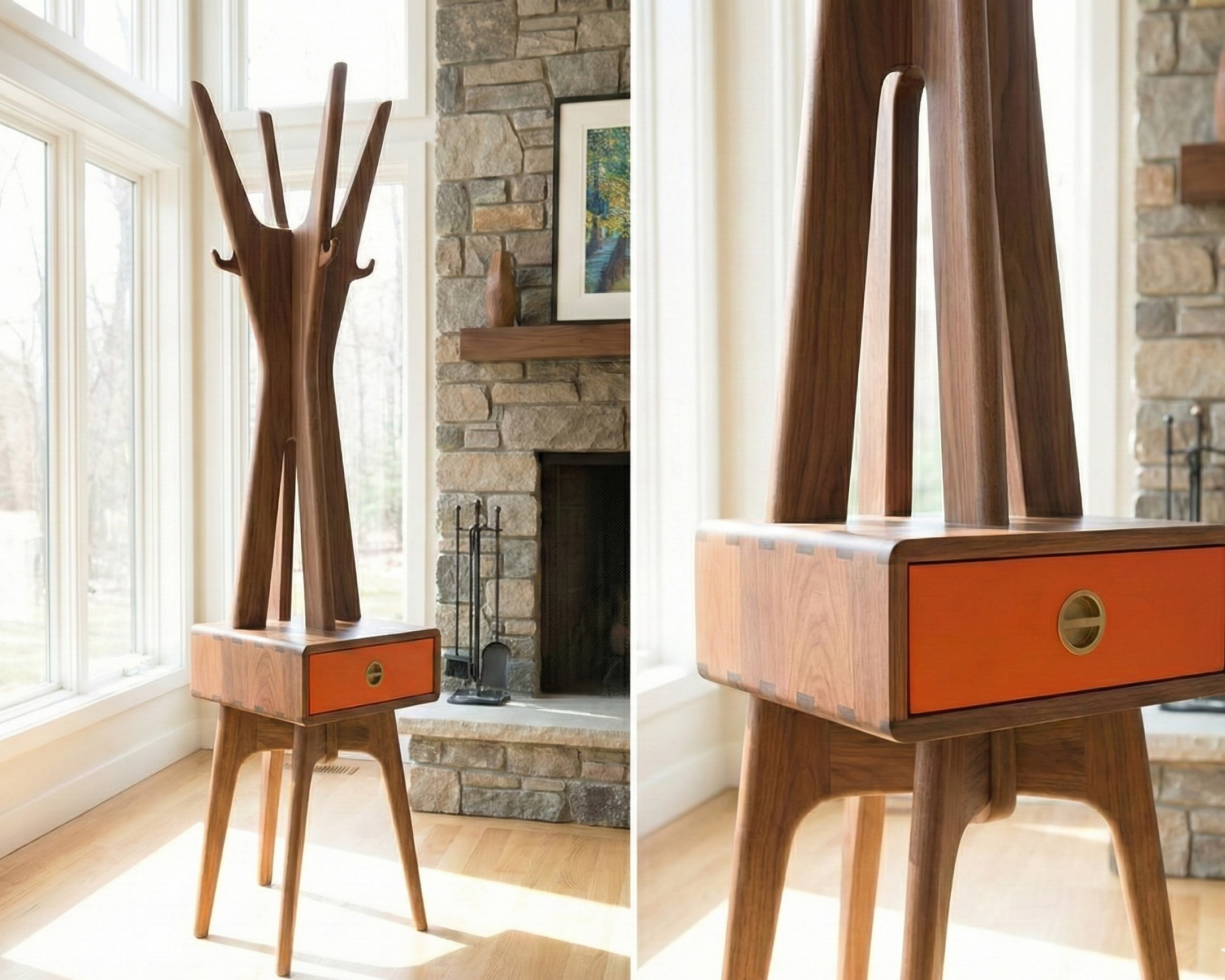 A wooden coat rack and side table in a sunlit living room, with large windows and a stone fireplace.