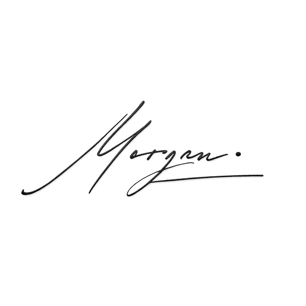 Signature that reads 'Megan' in black ink on a transparent background.