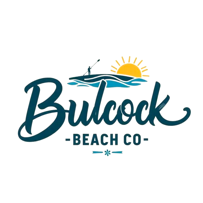 Logo for Bulock Beach Co. featuring a person paddleboarding at sunset over a wave.
