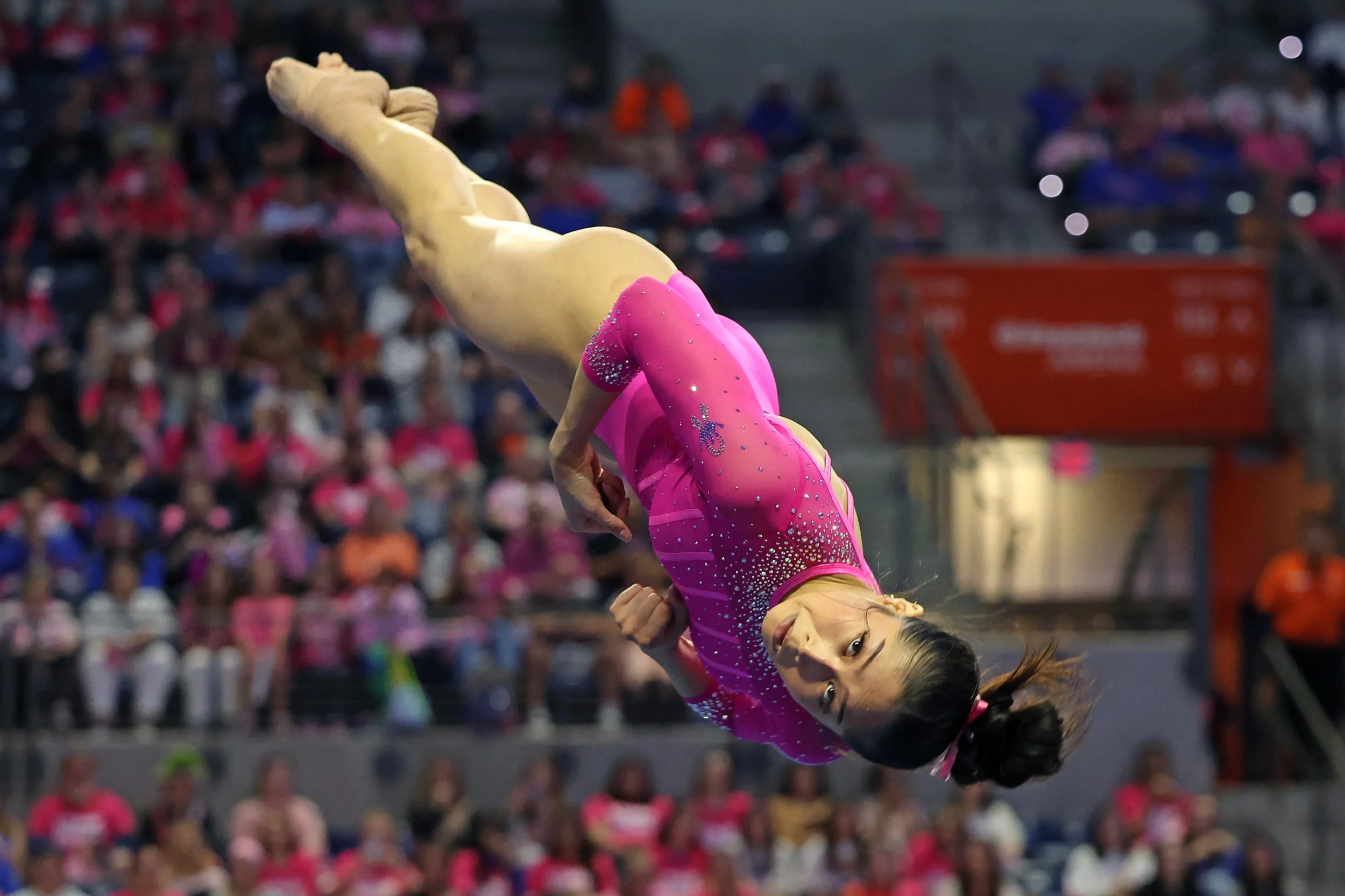 Victoria Nguyen soars through the air during her floor routine at UF gymnastics' meet against Auburn at the Stephen C. O’Connell Center in Gainesville, Fla., on Friday, Feb. 14, 2025. 