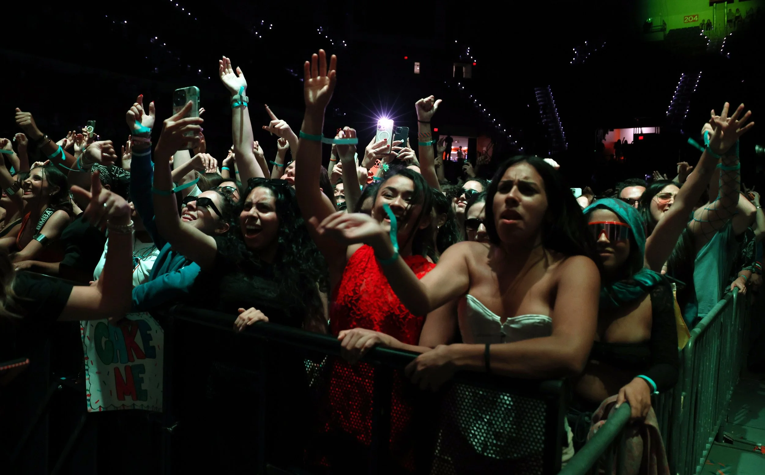 Attendees jump, dance and sing in the pit during Steve Aoki’s set at the University of Florida’s Gator Growl at the O’Connell Center on Friday, Oct. 17, 2025.