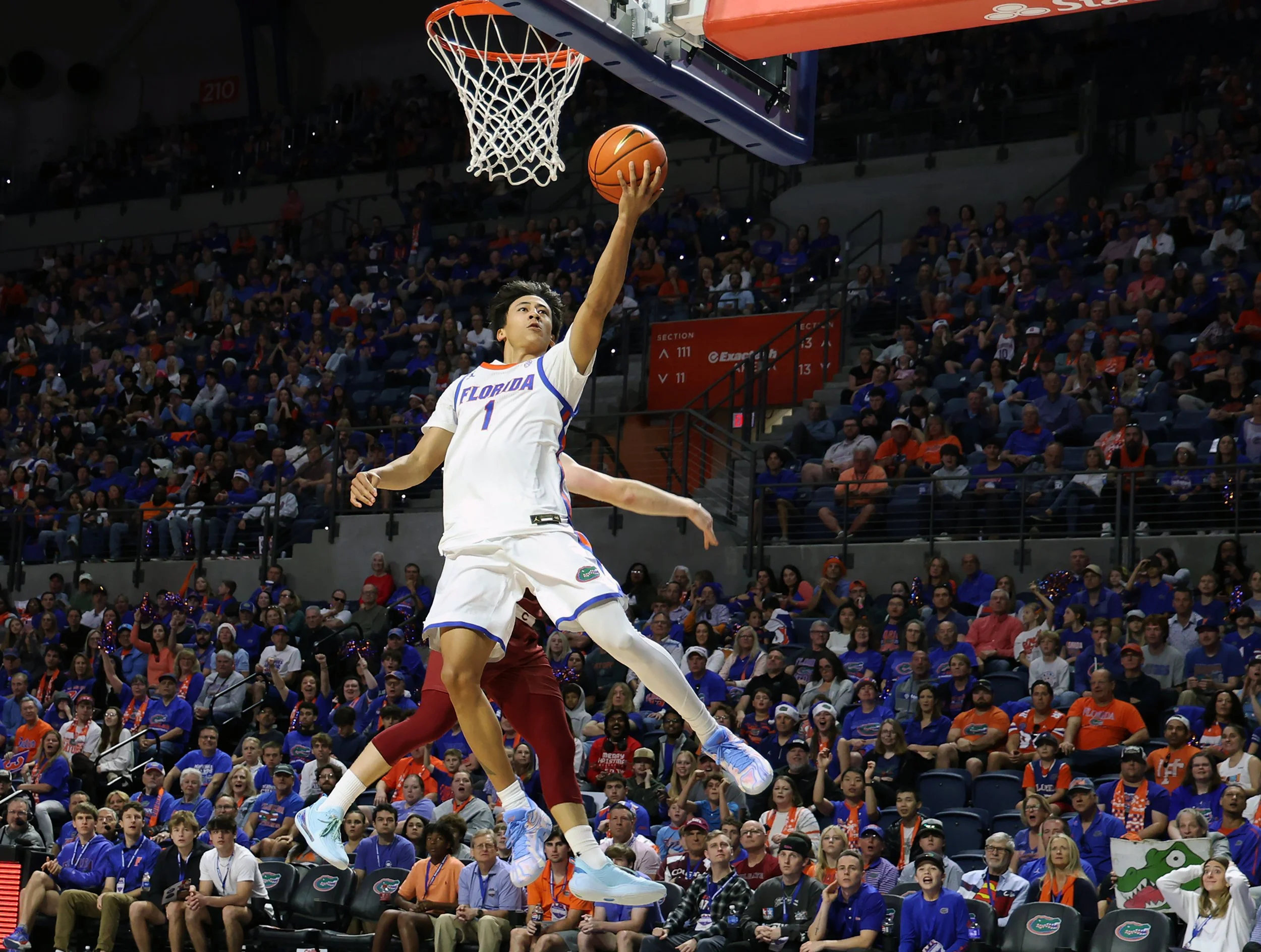 Florida's guard Xaivian Lee jumps to score during Florida’s game against Colgate at the O’Connell Center in Gainesville, Fla., on Sunday, Dec. 21, 2025.