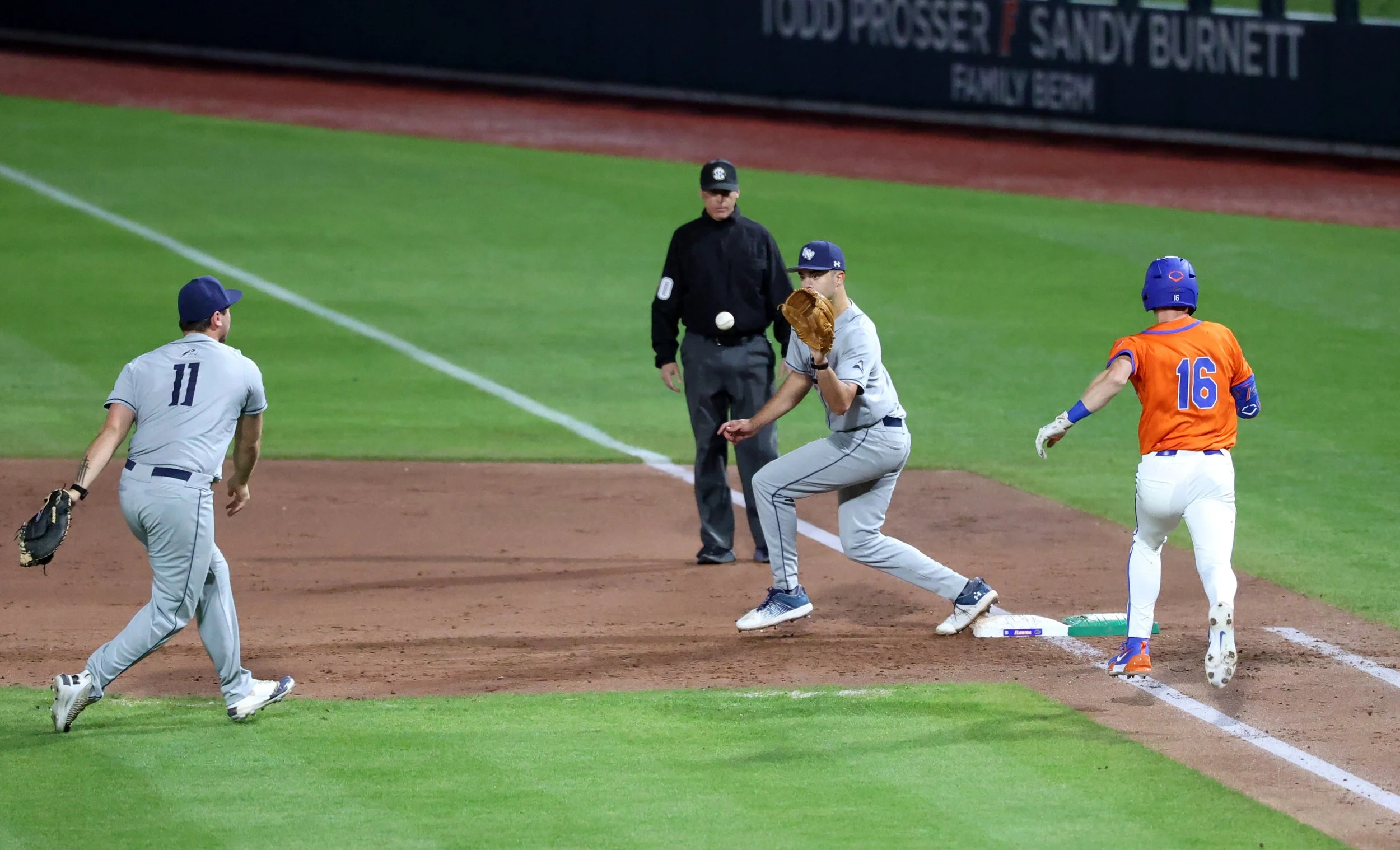 Hayden Yost races the ball to first base during UF baseball hosts North Florida at Condron Family Ballpark in Gainesville, Fla., Wednesday, Feb. 26, 2025.