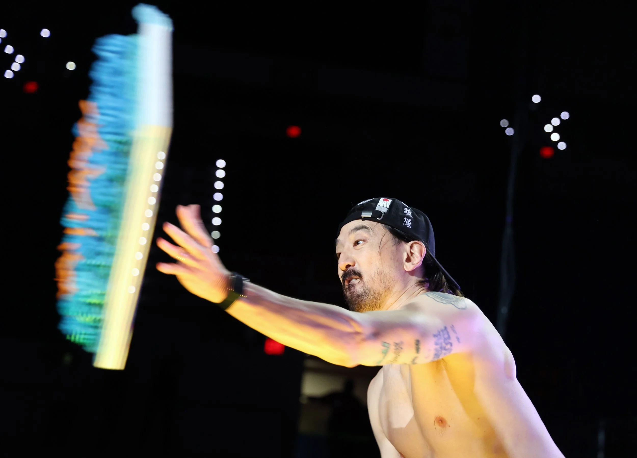 Steve Aoki throws a cake into the audience at the University of Florida’s Gator Growl at the O’Connell Center on Friday, Oct. 17, 2025.