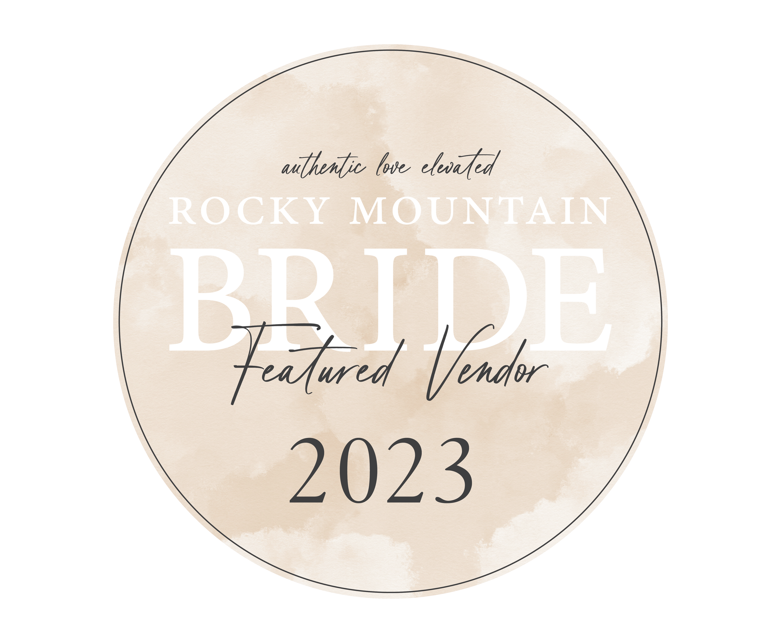 A circular event badge with a beige watercolor background. The text reads 'authentic love elevated ROCKY MOUNTAIN BRIDE Featured Vendor 2023' in black and white fonts.
