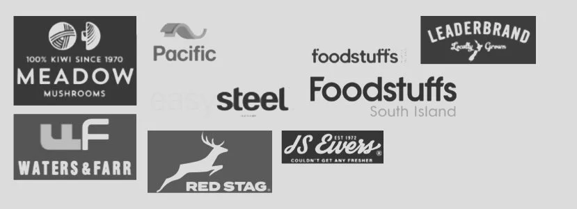 A collage of various black-and-white logos for food brands, including Meadow Mushrooms, Pacific, Foodstuffs, LeaderBrand, Waters & Farr, Red Stag, and S. Ewers.