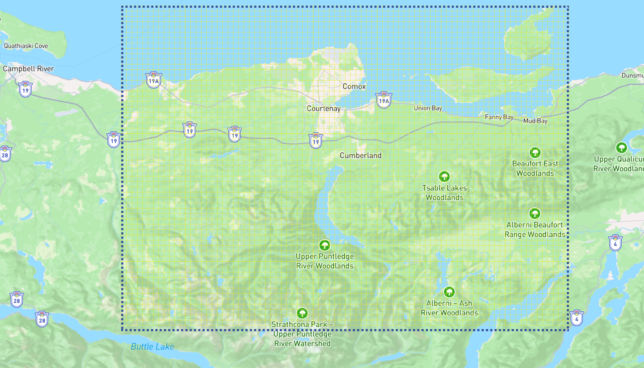 Map of the Upper Puntledge River Watershed area with marked woodlands including Chalk Lakes, Upper Qualicum River Woodland, Beaufort East Woodlands, and range woodlands, bordered by a blue dotted line.