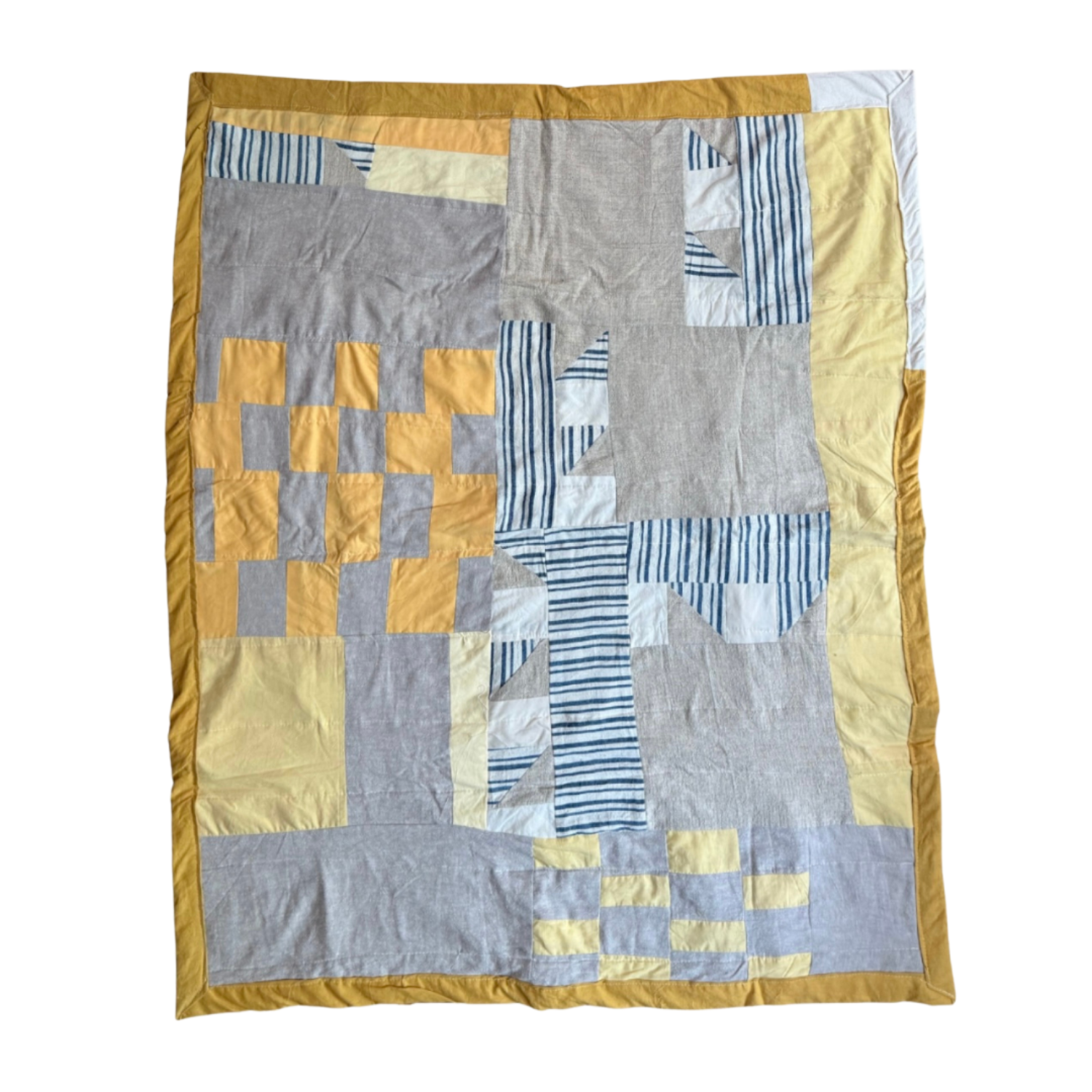 Patchwork quilt with geometric and striped patterns in yellow, gray, white, and blue colors.