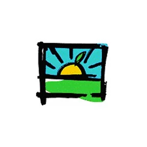 A man and woman smiling together indoors at a social event.