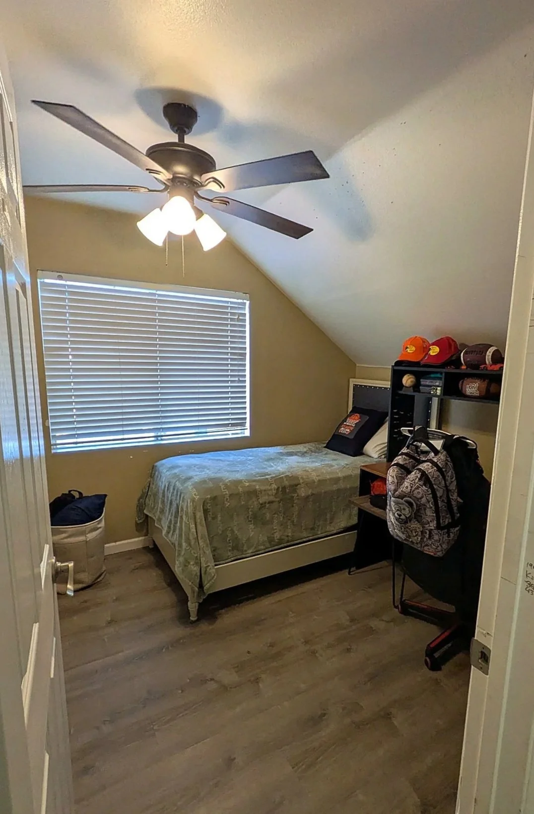 Upstairs bedroom under the pitched roofline.