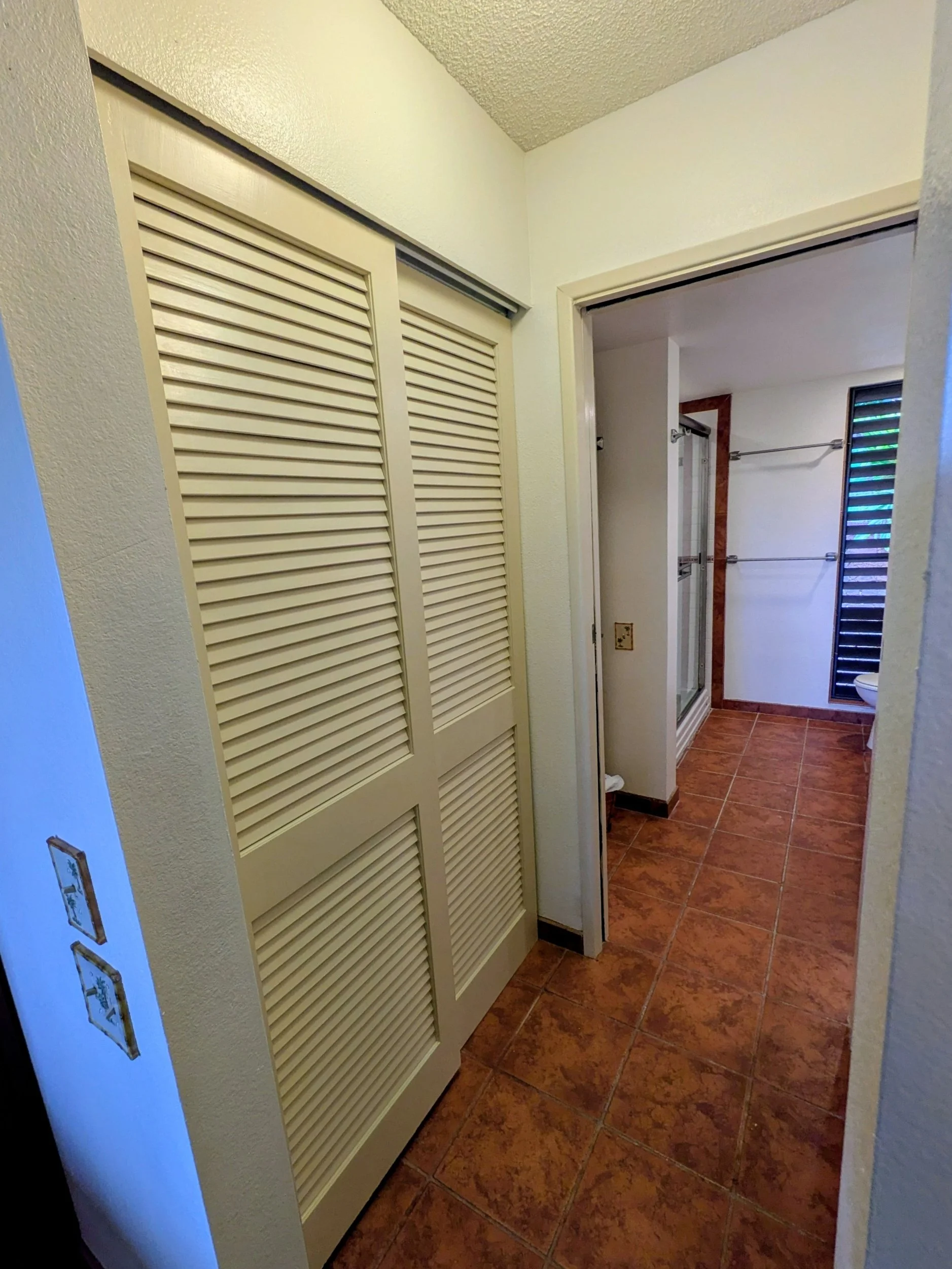Closet One in Hallway to Bathroom