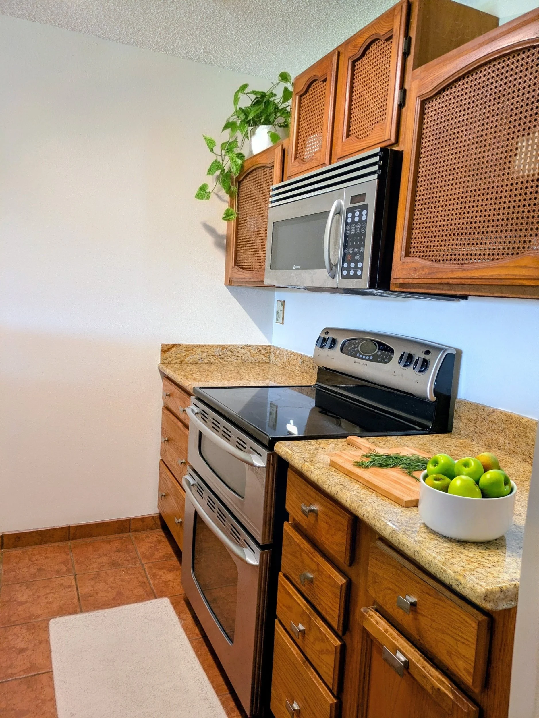  Kitchen Virtually staged — Plant and Food digitally added to show layout potential.