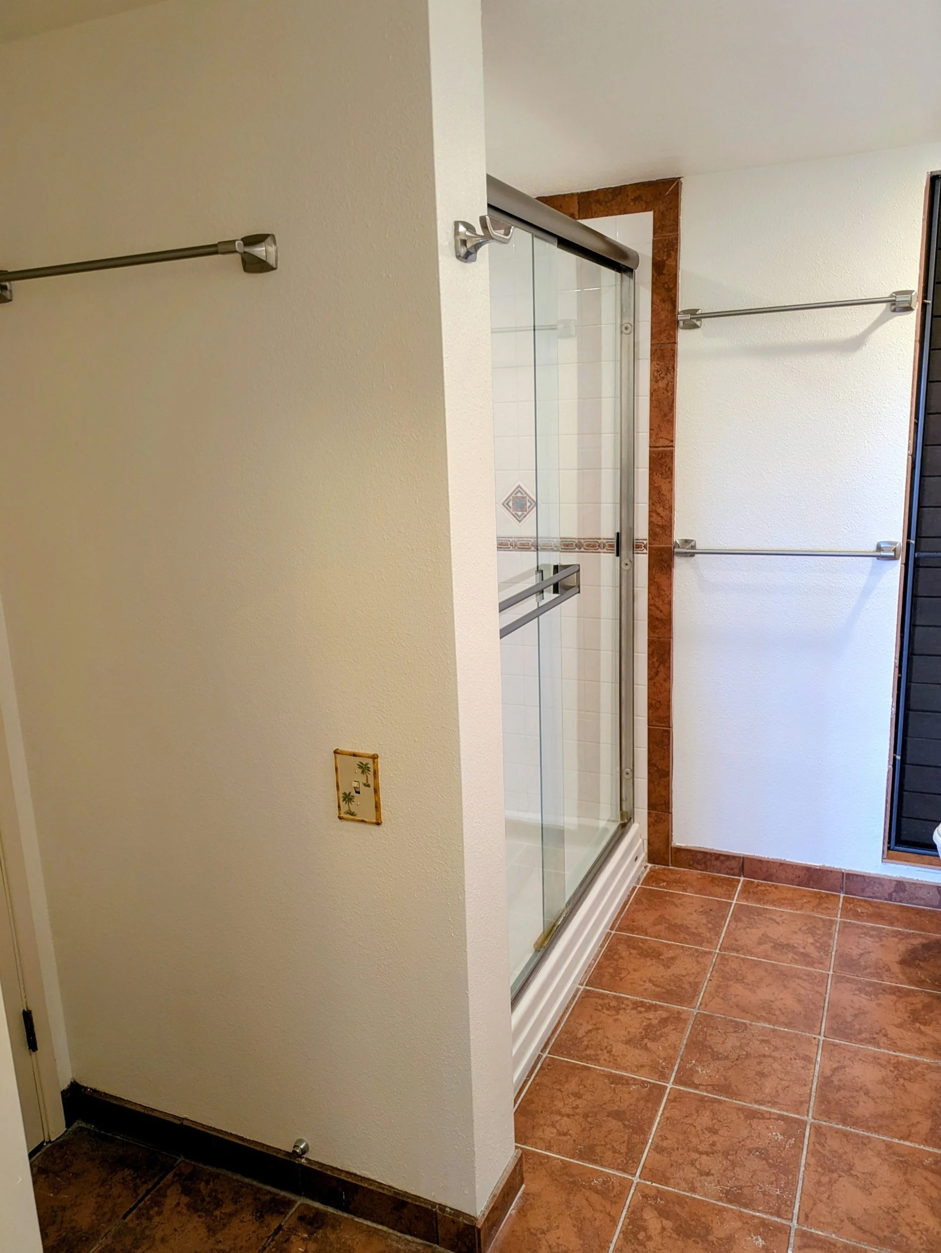 View of Shower and Other Door to the Hallway to Kitchen
