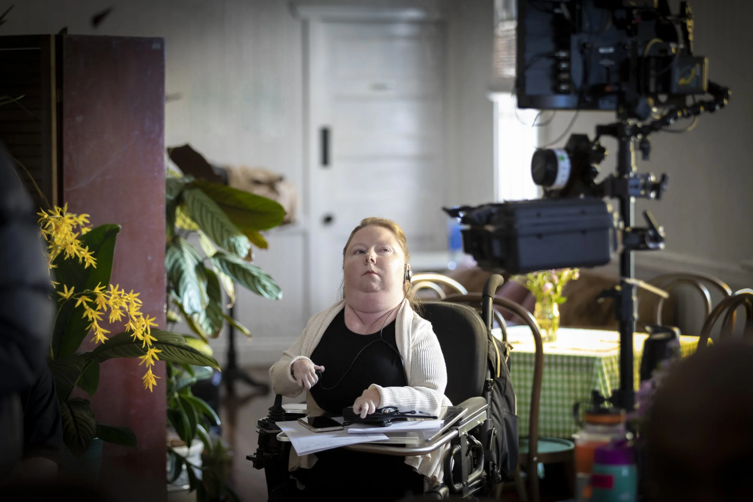 Stephanie Dower, in her powerchair, on the film set of Sunshine,