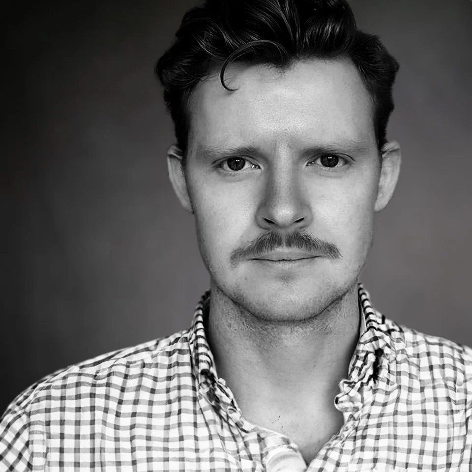 Black-and-white portrait of Jamie Reynolds, Product, GTM & Fundraising Strategist.