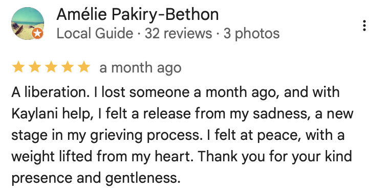 A review written by Amélie Pakiry-Bethon, a local guide, expressing gratitude and emotional release after loss, mentioning help from Kaylani, and thanking for kindness and gentleness.