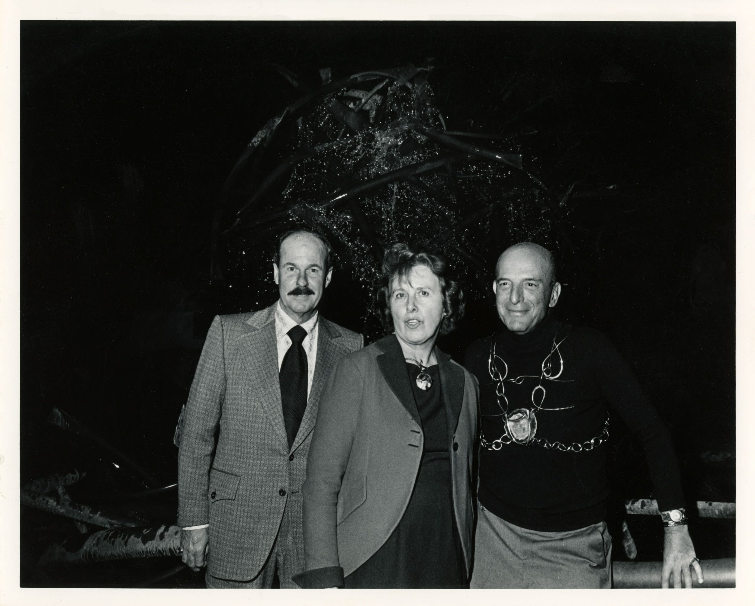 Claire Falkenstein with Louis Heyn (right, shown wearing Falkenstein's  Body Chain ) at the dedication of  Structure and Flow #3  (1969) at the Long Beach Museum of Art, California, 1972