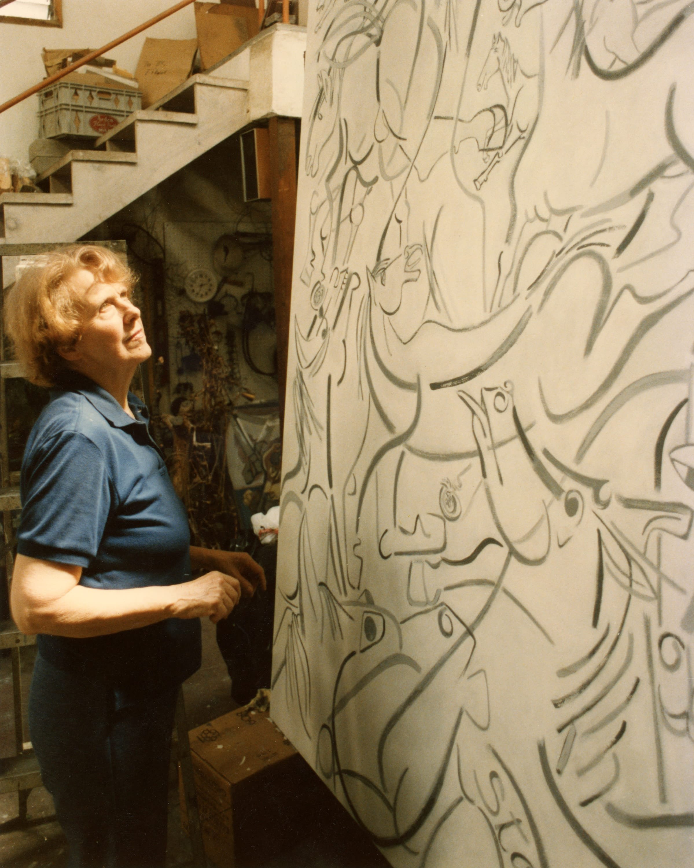 Claire Falkenstein with  Stampede  in her studio in Venice, California, 1987. Photo by Gordon B. Elkins. Photo from the collection of Lani Martin