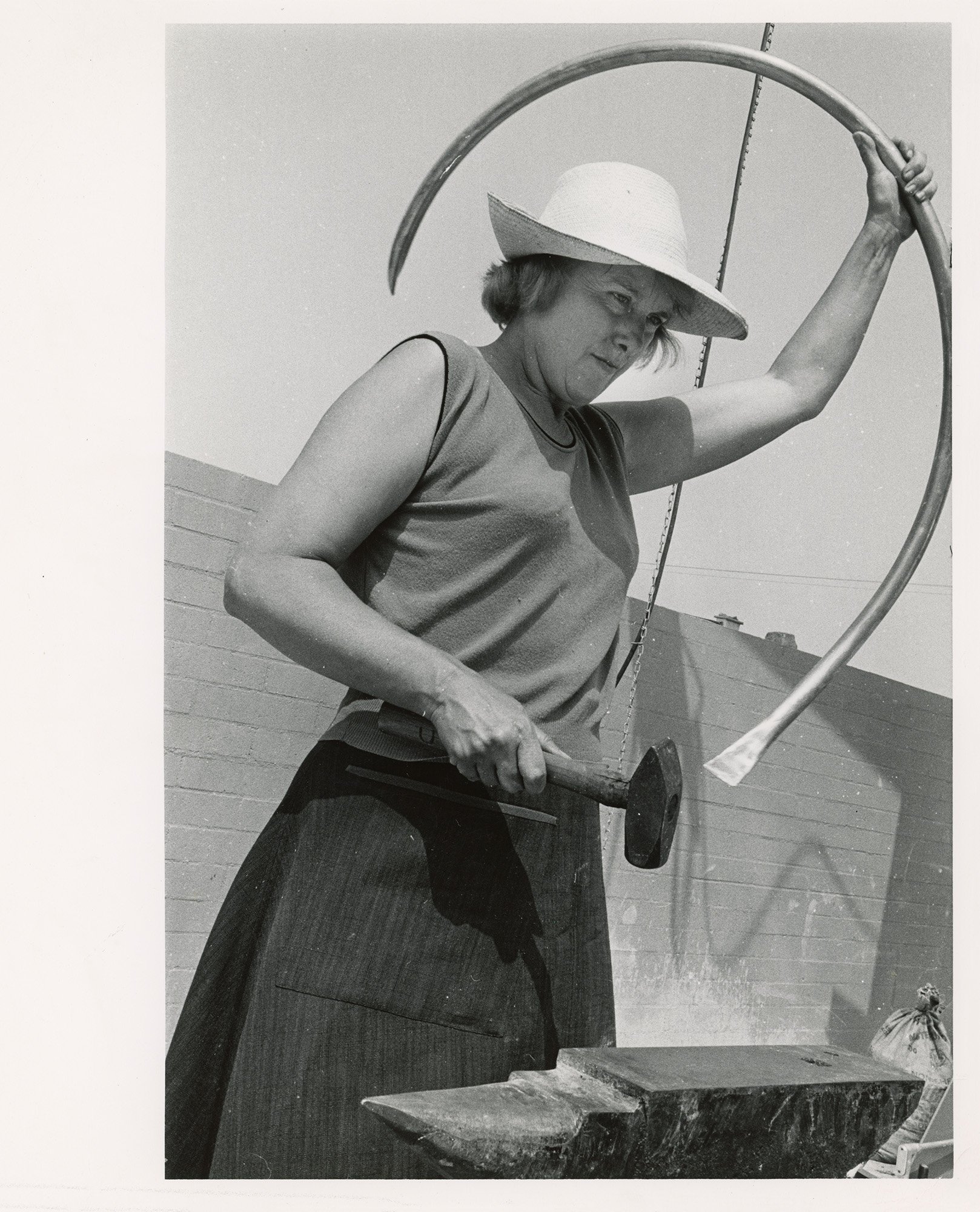 Claire Falkenstein working on a sculpture, Venice, California, c. 1960s. Photo from the collection of Lani Martin