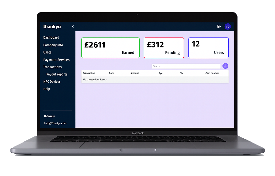 Laptop screen displaying a financial dashboard with earnings of £2611, pending amount of £312, and 12 users, along with menu options on the left side.