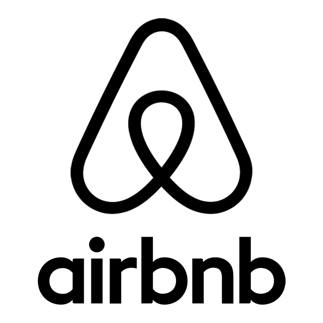 Black and white Airbnb logo featuring a stylized heart-shaped symbol with the word 'airbnb' underneath