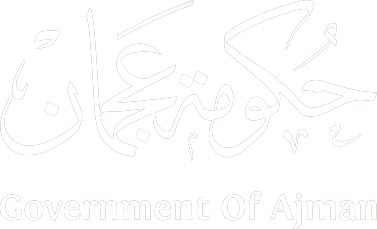 Arabic calligraphy with the text 'حكومة عجمان' and its English translation 'Government of Ajman' below.