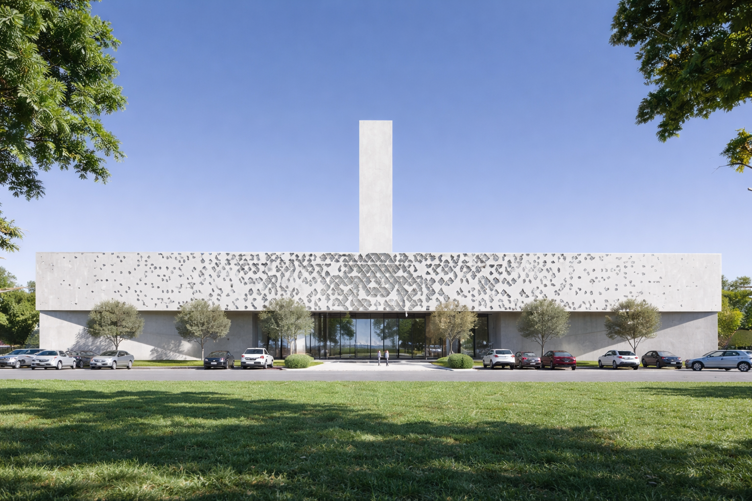 Modern church building with a tall cross-shaped tower, large windows, surrounded by green trees and parked cars, under a clear blue sky.
