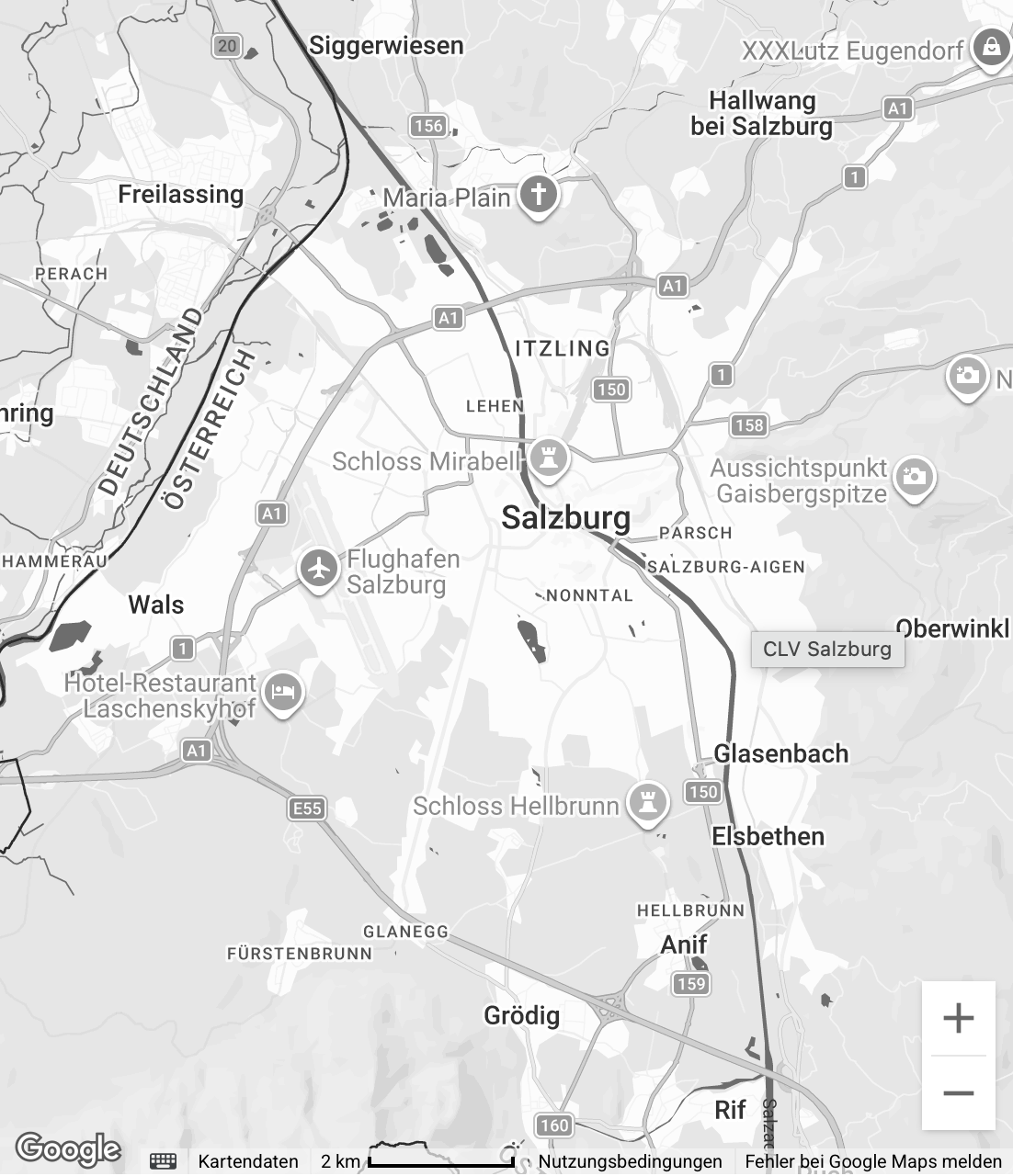 Eine Karte von Salzburg und Umgebung in Schwarz-Weiß, mit Markierungen für Sehenswürdigkeiten wie Schloss Mirabell, Flughafen Salzburg und Schloss Hellbrunn, sowie Stadtteilen und Autobahnen.