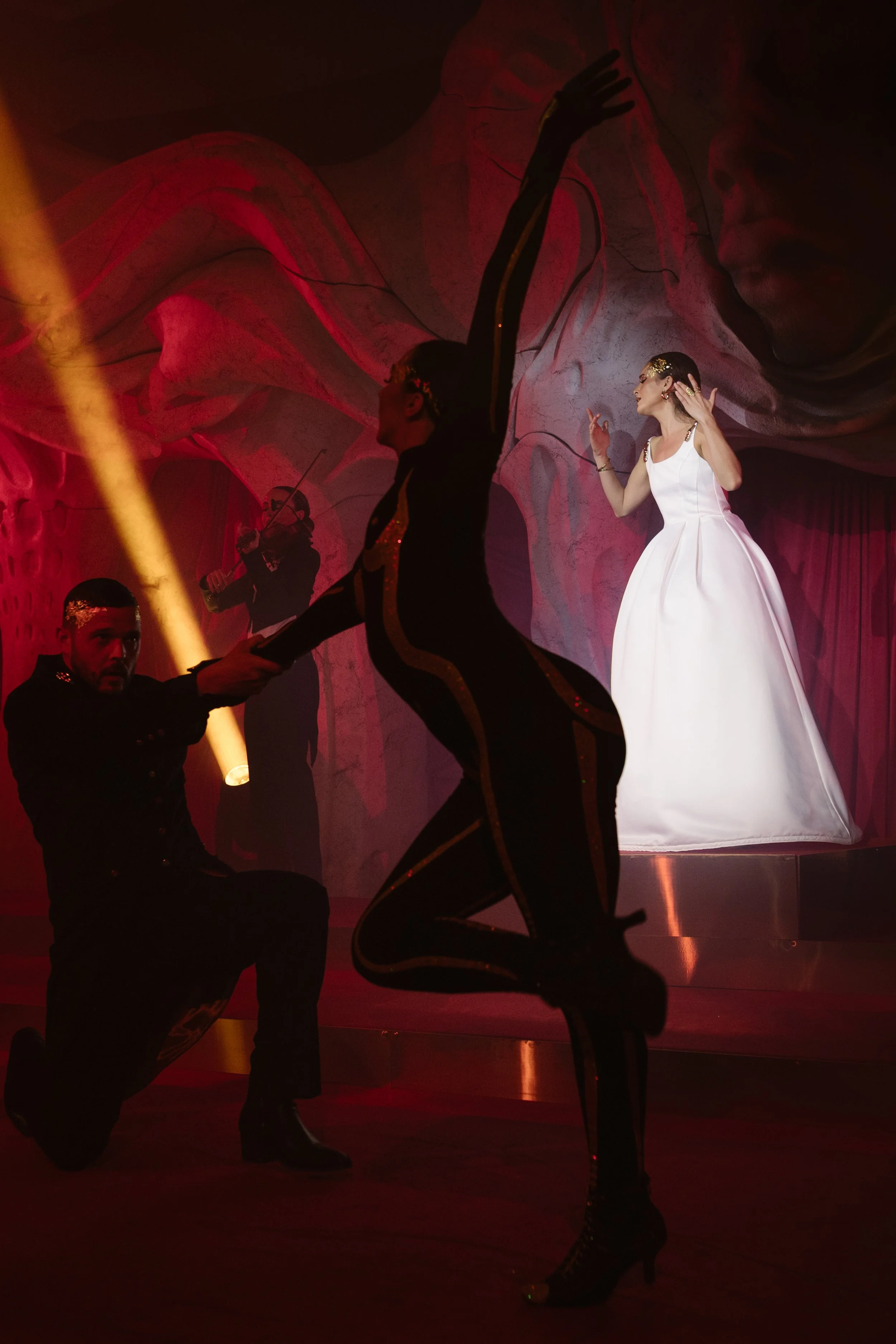 Dancers performing with live soprano and string musicians
