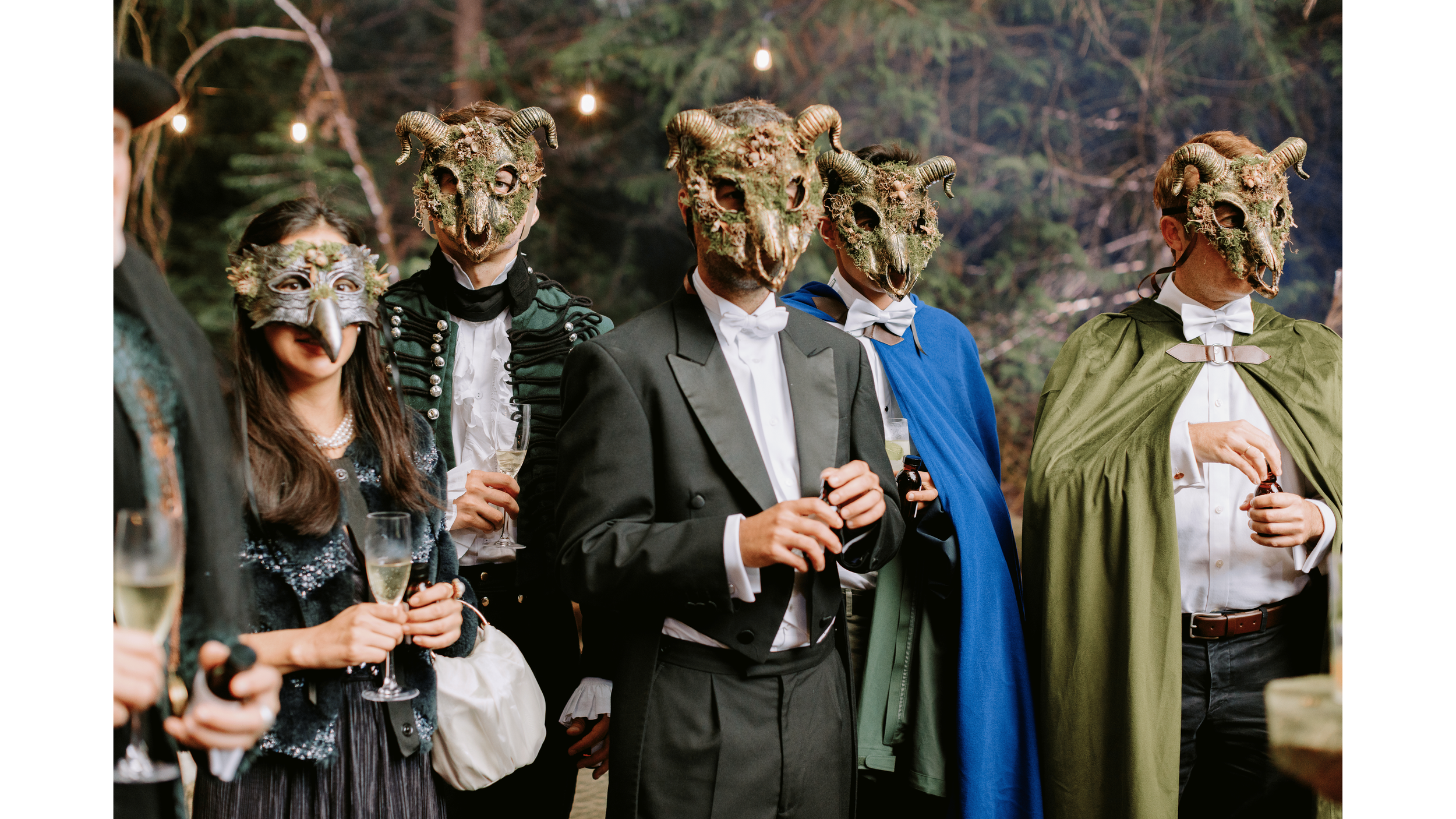 guests at a party in woodland masks